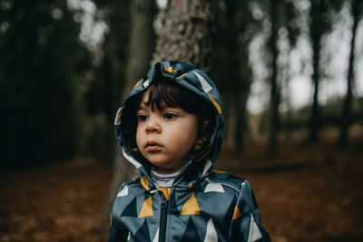 Portrait of boy in forest