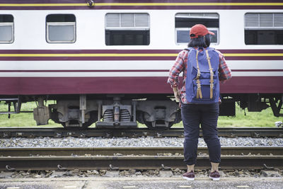 Full length rear view of train at railroad station