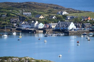 High angle view of houses by sea