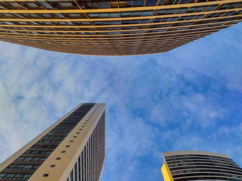 Low angle view of modern building against sky