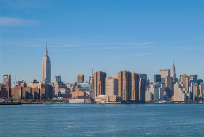 View of buildings in city at waterfront