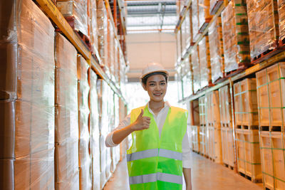 Full length of man working in building