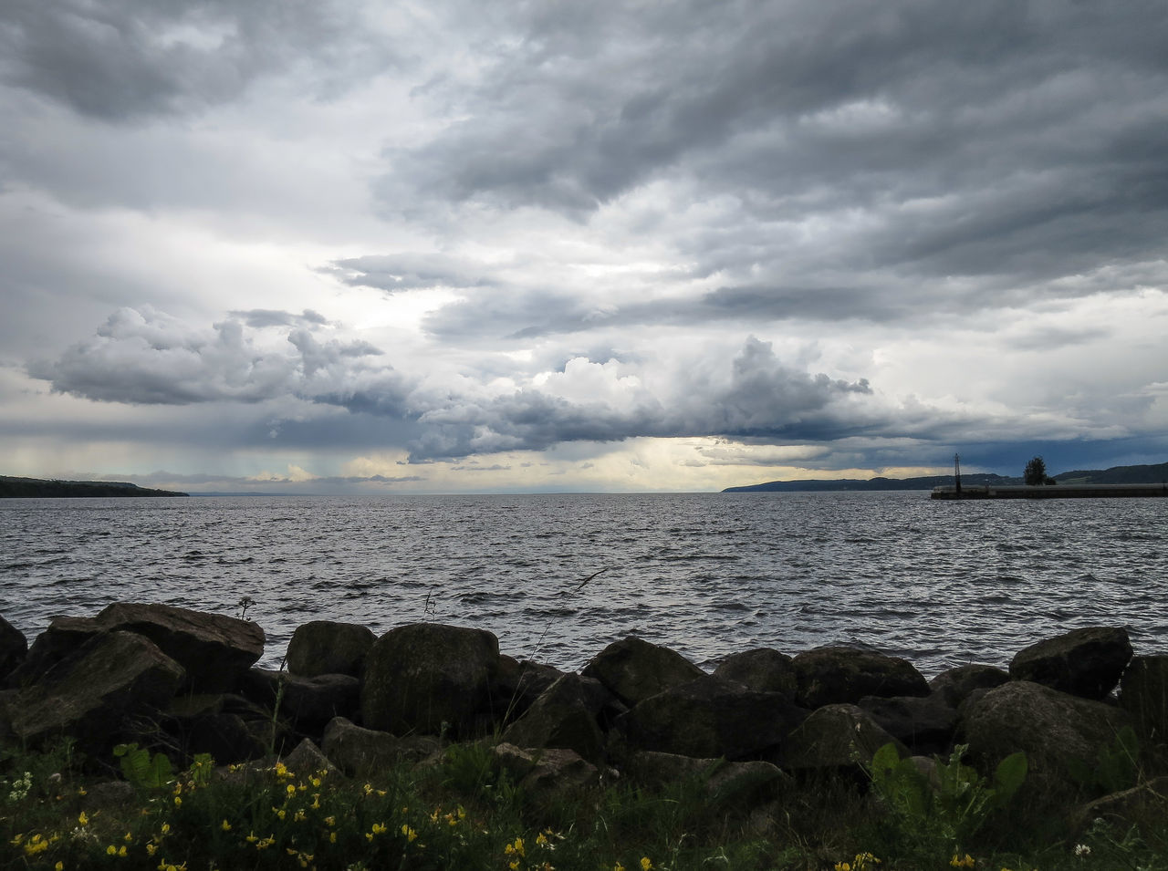 water, sea, sky, horizon over water, scenics, tranquil scene, cloud - sky, tranquility, beauty in nature, nature, cloudy, rock - object, cloud, idyllic, beach, shore, remote, non-urban scene, outdoors, coastline