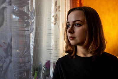 Portrait of beautiful woman at home