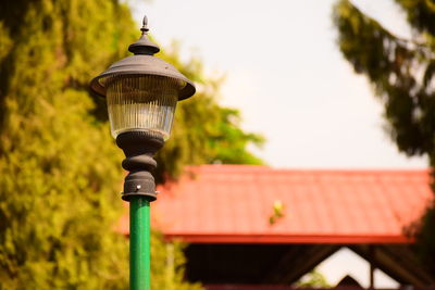 Close-up of street light against sky