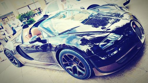 Reflection of car on side-view mirror