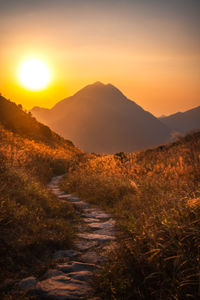 Scenic view of landscape against sky during sunset