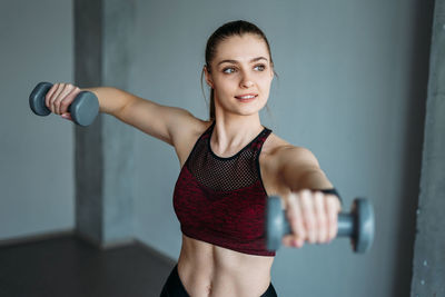 Woman exercising at gym