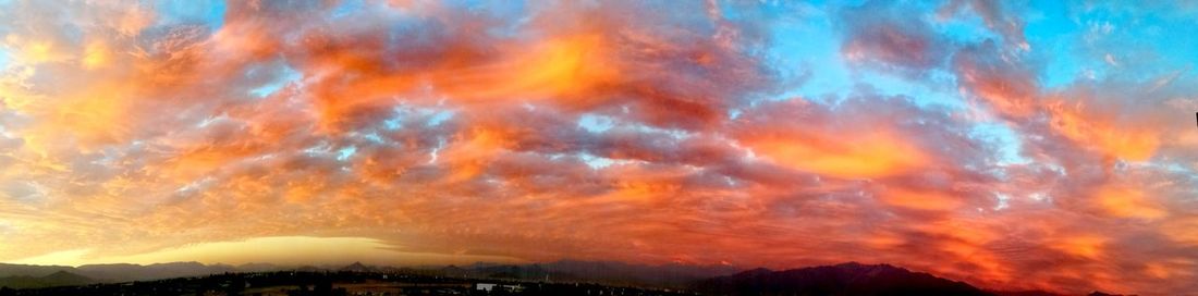 Scenic view of rainbow against sky at night