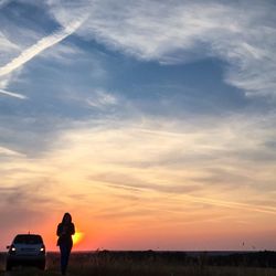 Scenic view of landscape at sunset