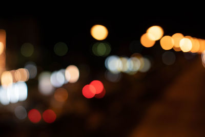 Defocused image of illuminated lights at night