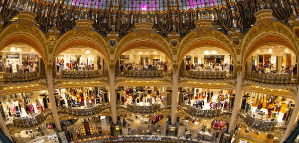 Group of people in glass building