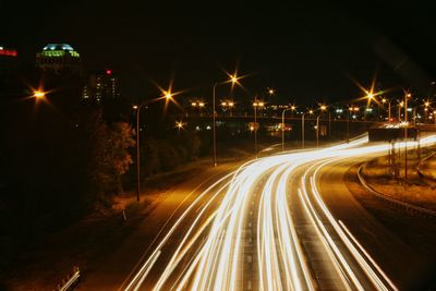 Light trails on road at night