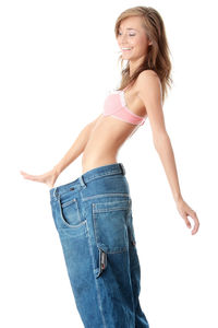 Portrait of a smiling young woman over white background