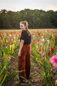 Full length of woman standing on field