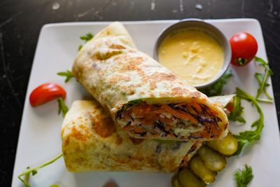 High angle view of breakfast served in plate on table