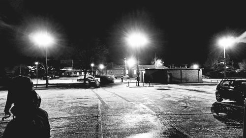 Illuminated street light at night