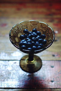 Close-up of berries on table in glass