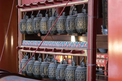 Low angle view of illuminated candles in temple