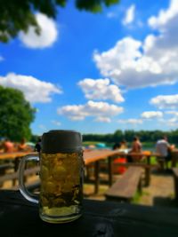 Close-up of drink against sky