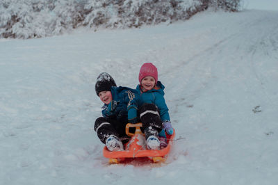 Children skiing on snow