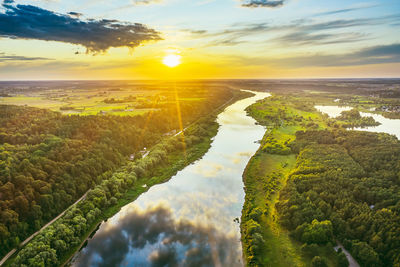 Scenic view of landscape against sky during sunset