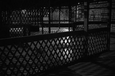 Shadow of railing on building