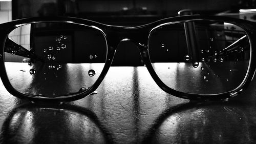 Close-up of sunglasses on table