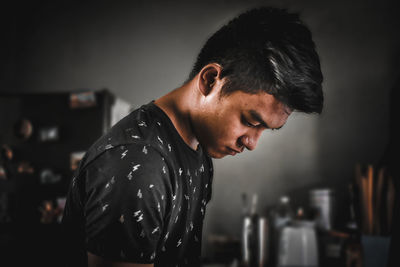 Portrait of young man looking away