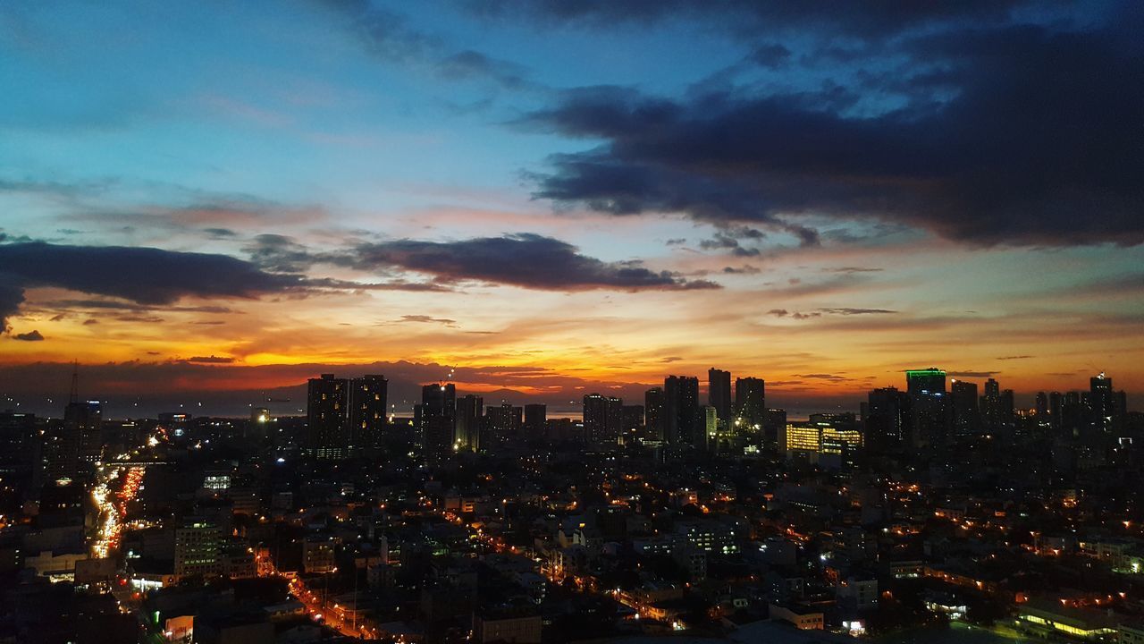 AERIAL VIEW OF CITYSCAPE DURING SUNSET