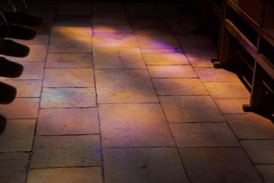 High angle view of illuminated footpath at night