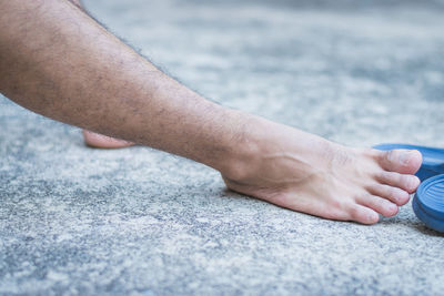 Low section of person legs on floor