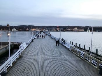 Pier over sea against sky