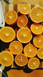 Directly above shot of orange slices on cutting board