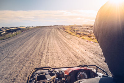 High angle view of vehicle on dirt road