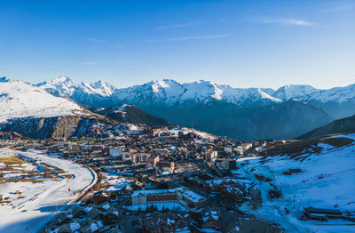 Panoramic drone view of landscape and ski resort in french alps, alpe d'huez, france - europe