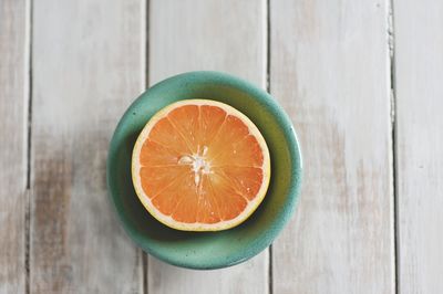 Directly above shot of orange slices on table