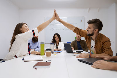 Business colleagues working at office