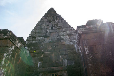 Low angle view of old building against sky