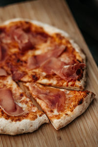 Close-up of pizza on cutting board