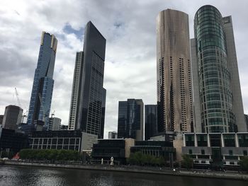Modern buildings against sky in city