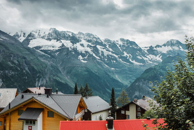Roofs of traditional chalet in swiss alps. switzerland, jungfrau. cozy small village in mountains. 