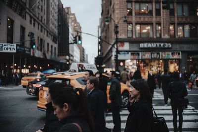 People walking on city street