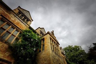Low angle view of old building against sky