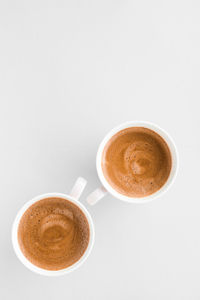 High angle view of coffee on white background