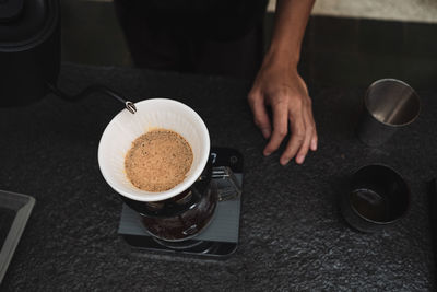 High angle view of coffee cup on table