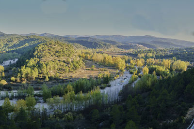 Narrow river between the green mountains. colors of nature