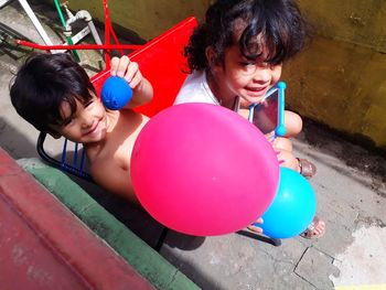 Cute girl playing with balloons