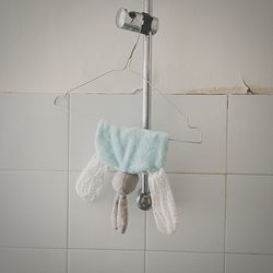 Clothes hanging on wall