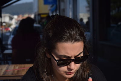 Portrait of woman wearing sunglasses